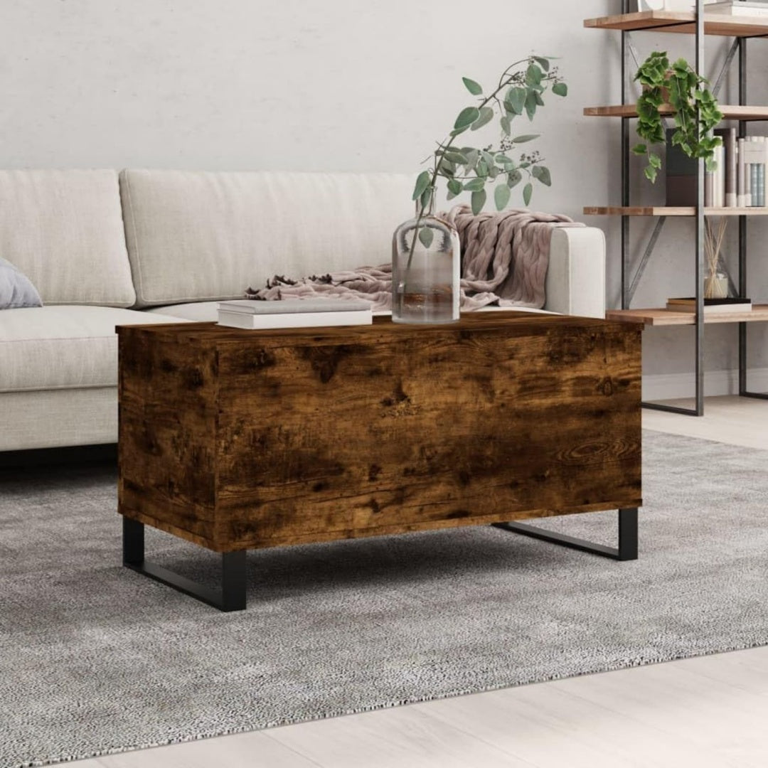 Table basse elegant gris pieds metalliques